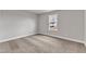 Neutral bedroom with plush carpet and a window for natural light at 104 Wilderness Ct, Mebane, NC 27302