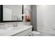 Bright bathroom featuring a white vanity with a modern sink and neutral tile in the shower at 10620 Pleasant Branch Dr # 9, Raleigh, NC 27614