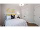 Comfortable bedroom with natural light, a cozy bed with decorative pillows, and ample closet space at 10620 Pleasant Branch Dr # 9, Raleigh, NC 27614