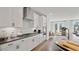 Stylish kitchen featuring stainless steel appliances, gas cooktop, and granite countertops at 10620 Pleasant Branch Dr # 9, Raleigh, NC 27614