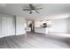 Open-concept kitchen and living area featuring an island, and white cabinets at 109 Wilderness Ct, Mebane, NC 27302