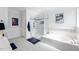 Bright bathroom featuring a glass-enclosed shower and alcove tub at 123 Glasgow Dr, Clayton, NC 27520