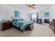 Spacious main bedroom with a sitting area, fireplace, and ceiling fan at 123 Glasgow Dr, Clayton, NC 27520