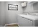 Functional laundry room with a new washer and dryer unit at 133 Cavalier Rider Run, Wendell, NC 27591