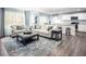 Inviting living room with comfortable seating, stylish decor, and ample natural light at 133 Cavalier Rider Run, Wendell, NC 27591
