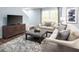 Cozy living room area with neutral tones, comfortable seating and stylish decor at 133 Cavalier Rider Run, Wendell, NC 27591