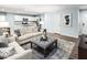 Open-concept space blending living and kitchen areas, furnished with stylish decor at 133 Cavalier Rider Run, Wendell, NC 27591