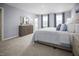 Serene main bedroom with comfortable decor, natural light, and an en-suite bathroom at 133 Cavalier Rider Run, Wendell, NC 27591