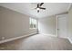 Comfortable bedroom featuring neutral walls and a ceiling fan at 1600 Sweetwater Ln, Raleigh, NC 27610