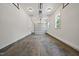 Clean, empty garage space with a concrete floor and white walls at 1600 Sweetwater Ln, Raleigh, NC 27610