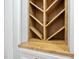 Custom built-in wine storage rack featuring finished wood and modern design at 1600 Sweetwater Ln, Raleigh, NC 27610