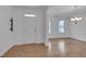 Bright foyer featuring hardwood floors and a view into the spacious living area at 1680 Mint River Dr, Apex, NC 27502