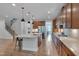 Spacious kitchen features a large island, stainless steel appliances, and ample cabinet space at 1680 Mint River Dr, Apex, NC 27502