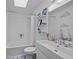 Cozy bathroom featuring white vanity and neutral color scheme, plus tub and shower at 202 Oxford Hills Dr, Chapel Hill, NC 27514