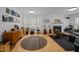 Bright and airy living room with a fireplace, hardwood floors, and stylish decor at 202 Oxford Hills Dr, Chapel Hill, NC 27514