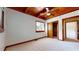 Bright bedroom with a ceiling fan, closet, and a window offering an outside view at 2118 Timberlake Dr, Raleigh, NC 27604
