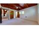 Spacious bedroom with a ceiling fan, multiple closets, and natural light from the window at 2118 Timberlake Dr, Raleigh, NC 27604