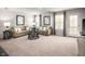 Spacious living room with neutral decor, comfortable seating, and abundant natural light at 213 Suburban Meadow Pass, Wendell, NC 27591