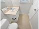 Bathroom featuring sink, vanity, and white toilet at 2356 Bay Harbor Dr, Raleigh, NC 27604