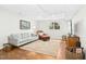 Cozy basement living area with plush seating, decorative rug, and a window offering natural light at 248 Sweet Bay Pl, Carrboro, NC 27510