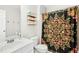 Bathroom featuring a sink, toilet, and shower with floral curtain at 248 Sweet Bay Pl, Carrboro, NC 27510