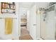 Bathroom with shower stall, wood-look flooring, and view to bedroom at 248 Sweet Bay Pl, Carrboro, NC 27510