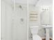 Clean and functional bathroom with a walk-in shower, pedestal sink, and mirrored vanity at 248 Sweet Bay Pl, Carrboro, NC 27510