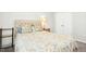 Cozy bedroom with plush carpet, floral bedding, and tufted headboard at 248 Sweet Bay Pl, Carrboro, NC 27510