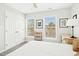 Bedroom with plush carpet, two bright windows, and double closet at 248 Sweet Bay Pl, Carrboro, NC 27510