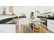 Well-equipped kitchen with black countertops, stainless steel appliances, and functional design at 248 Sweet Bay Pl, Carrboro, NC 27510