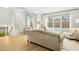 Open-concept living room with abundant natural light and hardwood floors at 248 Sweet Bay Pl, Carrboro, NC 27510