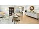 Bright living room featuring dining area, bookcase and hardwood floors at 248 Sweet Bay Pl, Carrboro, NC 27510