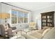 Bright living room featuring a large window and comfortable seating at 248 Sweet Bay Pl, Carrboro, NC 27510