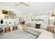 Open-concept living room flows into a kitchen, with modern decor and comfortable furnishings at 248 Sweet Bay Pl, Carrboro, NC 27510
