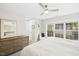 Bright main bedroom featuring soft carpet, a large window and neutral paint at 248 Sweet Bay Pl, Carrboro, NC 27510