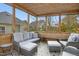 Relaxing screened porch with comfortable seating, offering a peaceful indoor-outdoor living space at 248 Sweet Bay Pl, Carrboro, NC 27510