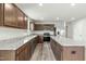 Kitchen with stainless steel appliances, granite counters and a large island at 265 Day Farm Dr, Lillington, NC 27546