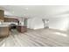 Open-concept kitchen and living area with plenty of space and natural light at 265 Day Farm Dr, Lillington, NC 27546