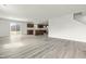 Bright living room next to the kitchen area, with sliding doors to outside at 265 Day Farm Dr, Lillington, NC 27546