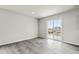 Room with a sliding door and gray floor at 265 Day Farm Dr, Lillington, NC 27546