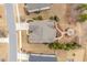 Aerial view of a single-Gathering home with a large backyard and a stone patio with firepit at 2675 Beckwith Rd, Apex, NC 27523