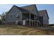 New home with a covered back porch, brick foundation and outdoor access doors at 2833 Faucette Ln, Burlington, NC 27217