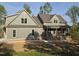 Charming craftsman-style home with board and batten siding, and a welcoming covered front porch at 2833 Faucette Ln, Burlington, NC 27217