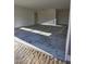 A spacious, unfinished garage with concrete floors and two doors at 2833 Faucette Ln, Burlington, NC 27217