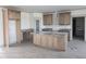 Large kitchen featuring custom wood cabinets, stainless steel appliances, and a center island at 2833 Faucette Ln, Burlington, NC 27217