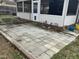 Outdoor patio area with pavers, ideal for outdoor entertaining at 300 W Carr St, Mebane, NC 27302