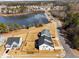 Aerial shot of modern homes near a picturesque lake at 3215 Jones Lake Rd, Fuquay Varina, NC 27526