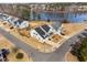 A high-angle view shows houses in the community overlooking the lake at 3215 Jones Lake Rd, Fuquay Varina, NC 27526