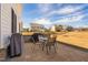 Backyard patio featuring comfortable outdoor seating and views of the neighborhood at 3215 Jones Lake Rd, Fuquay Varina, NC 27526