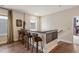 Stylish bar area features counter seating and scenic backyard views at 3215 Jones Lake Rd, Fuquay Varina, NC 27526